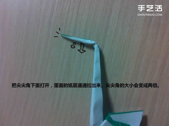 白天鹅折纸图解教程 纸折天鹅的方法步骤 -  www.shouyihuo.com