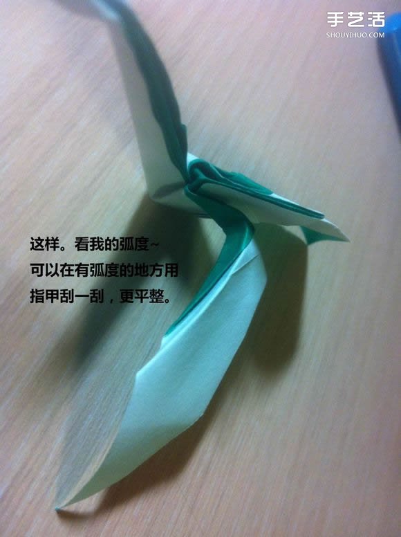 白天鹅折纸图解教程 纸折天鹅的方法步骤 -  www.shouyihuo.com