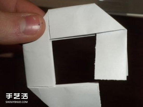 儿童折纸弹簧图解教程 简单弹簧的折法步骤 -  www.shouyihuo.com
