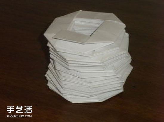 儿童折纸弹簧图解教程 简单弹簧的折法步骤 -  www.shouyihuo.com