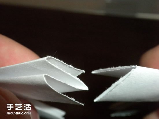 儿童折纸弹簧图解教程 简单弹簧的折法步骤 -  www.shouyihuo.com