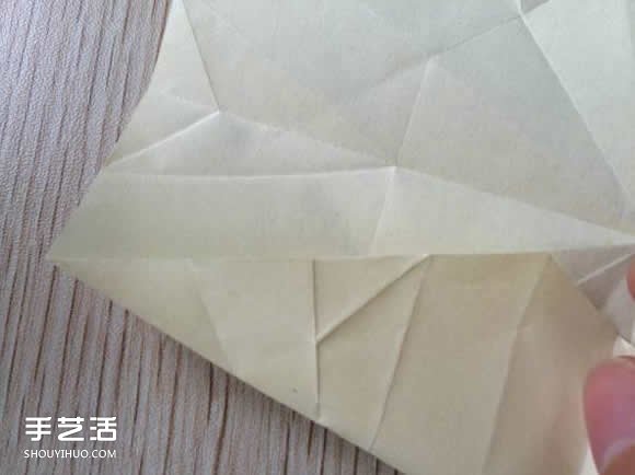 八瓣花的折法图解教程 折纸八瓣花的过程步骤 -  www.shouyihuo.com