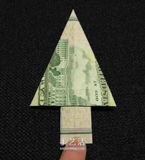 美元圣诞树的折法图解 纸币折纸圣诞树步骤 -  www.shouyihuo.com