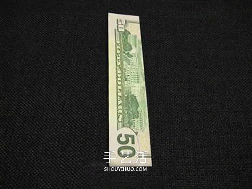 美元圣诞树的折法图解 纸币折纸圣诞树步骤 -  www.shouyihuo.com