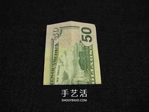 美元圣诞树的折法图解 纸币折纸圣诞树步骤 -  www.shouyihuo.com