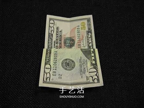 美元圣诞树的折法图解 纸币折纸圣诞树步骤 -  www.shouyihuo.com