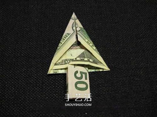 美元圣诞树的折法图解 纸币折纸圣诞树步骤 -  www.shouyihuo.com