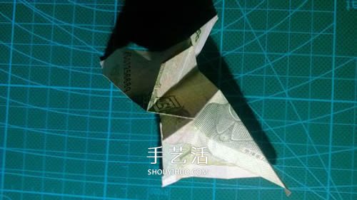 六角徽章的折法图解 一元纸币折纸六角徽章 -  www.shouyihuo.com