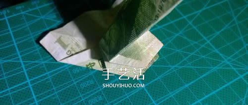六角徽章的折法图解 一元纸币折纸六角徽章 -  www.shouyihuo.com