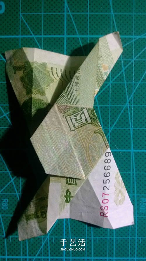 六角徽章的折法图解 一元纸币折纸六角徽章 -  www.shouyihuo.com