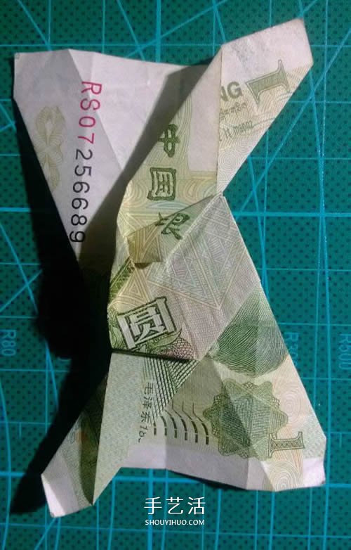 六角徽章的折法图解 一元纸币折纸六角徽章 -  www.shouyihuo.com