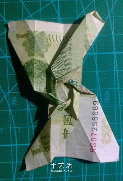六角徽章的折法图解 一元纸币折纸六角徽章 -  www.shouyihuo.com