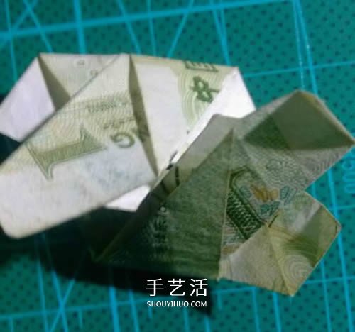 六角徽章的折法图解 一元纸币折纸六角徽章 -  www.shouyihuo.com