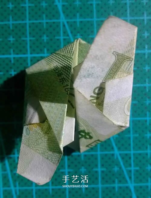 六角徽章的折法图解 一元纸币折纸六角徽章 -  www.shouyihuo.com