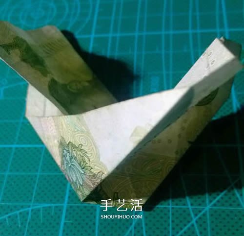 六角徽章的折法图解 一元纸币折纸六角徽章 -  www.shouyihuo.com