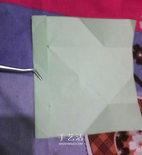 手工纸烟花的折法图解 折纸烟花的方法步骤图 -  www.shouyihuo.com