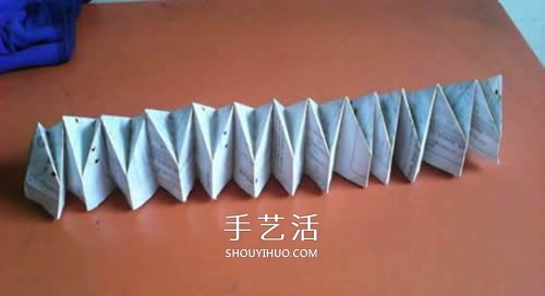 手工纸烟花的折法图解 折纸烟花的方法步骤图 -  www.shouyihuo.com