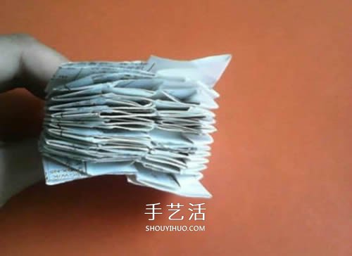 手工纸烟花的折法图解 折纸烟花的方法步骤图 -  www.shouyihuo.com