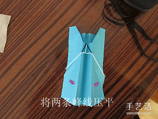 骷髅头的折纸方法图解 怎么折骷髅头的过程 -  www.shouyihuo.com