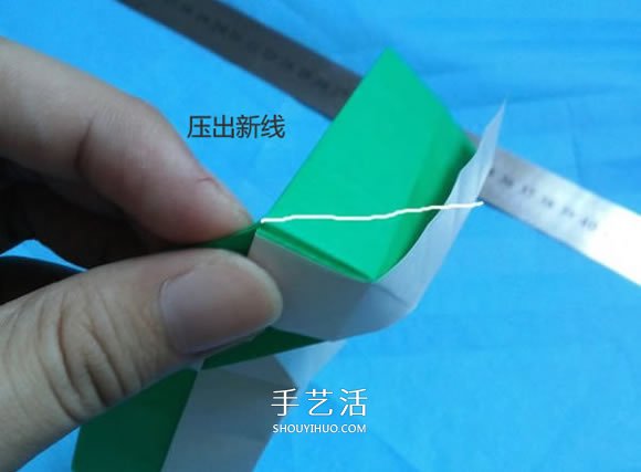 手工小猫的折纸步骤图 可爱小猫的折法图解 -  www.shouyihuo.com