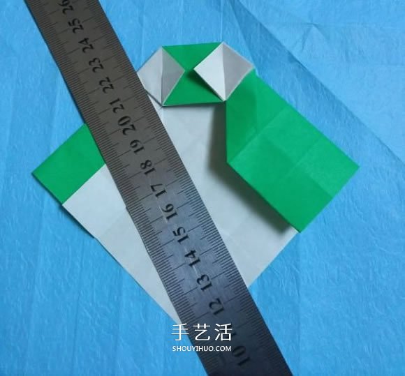 手工小猫的折纸步骤图 可爱小猫的折法图解 -  www.shouyihuo.com