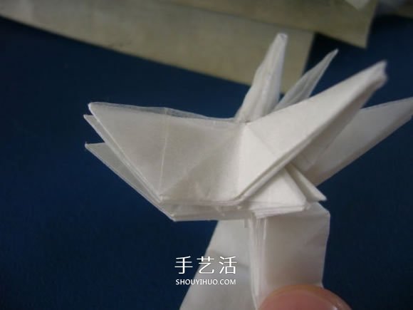 龙头戒指的折纸方法 手工折纸龙头戒图解教程 -  www.shouyihuo.com