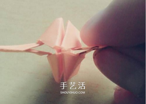 带翅膀气球的折法图解 折纸有翅膀的气球教程 -  www.shouyihuo.com
