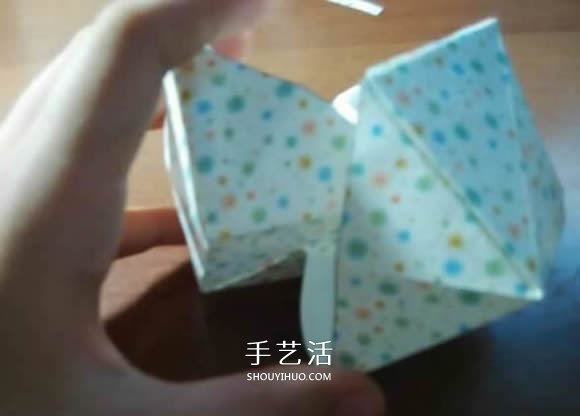 好玩魔术盒的折法图解 可收缩盒子的折法步骤 -  www.shouyihuo.com