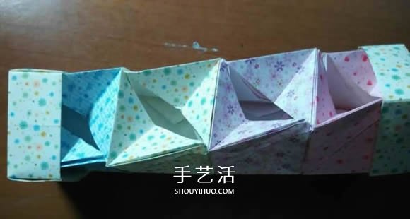 好玩魔术盒的折法图解 可收缩盒子的折法步骤 -  www.shouyihuo.com