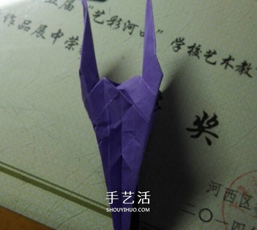 玫瑰千纸鹤的折法图解 手工折纸玫瑰千纸鹤 -  www.shouyihuo.com