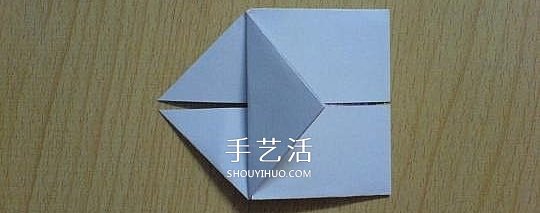 简单心形折纸图解教程 手工桃心的折法步骤 -  www.shouyihuo.com