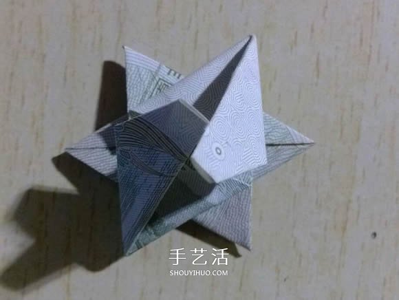 一元纸币折纸六角星 复杂纸币六角星星折法 -  www.shouyihuo.com