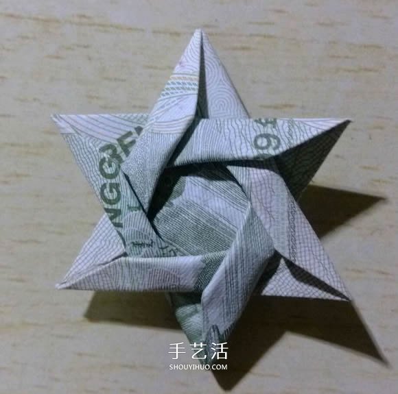 一元纸币折纸六角星 复杂纸币六角星星折法 -  www.shouyihuo.com