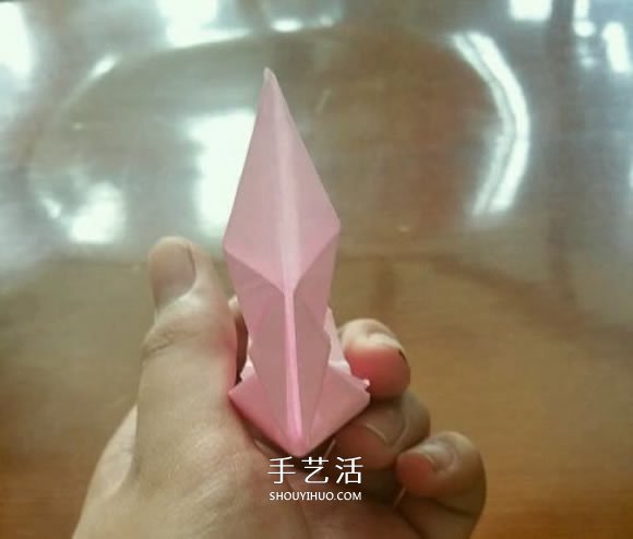 扬帆帆船的折法图解 折纸古代帆船的步骤图 -  www.shouyihuo.com
