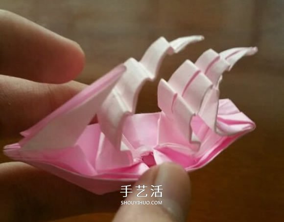 扬帆帆船的折法图解 折纸古代帆船的步骤图 -  www.shouyihuo.com