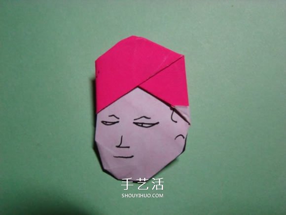 怎么折纸人物头像图解 戴帽子的人折法过程 -  www.shouyihuo.com