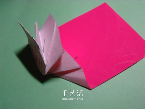 怎么折纸人物头像图解 戴帽子的人折法过程 -  www.shouyihuo.com