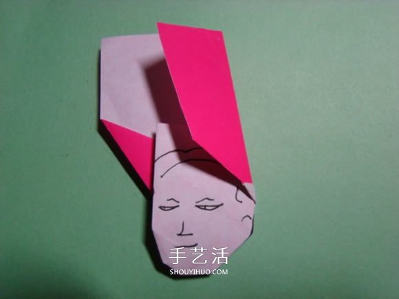 怎么折纸人物头像图解 戴帽子的人折法过程 -  www.shouyihuo.com