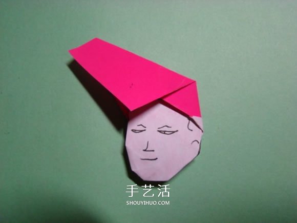 怎么折纸人物头像图解 戴帽子的人折法过程 -  www.shouyihuo.com
