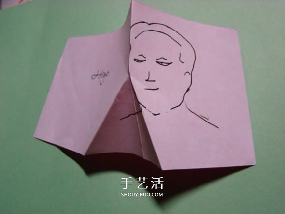 怎么折纸人物头像图解 戴帽子的人折法过程 -  www.shouyihuo.com