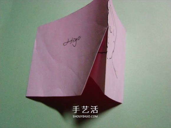 怎么折纸人物头像图解 戴帽子的人折法过程 -  www.shouyihuo.com