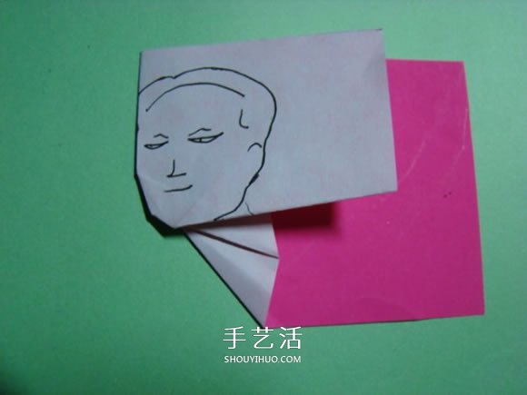 怎么折纸人物头像图解 戴帽子的人折法过程 -  www.shouyihuo.com