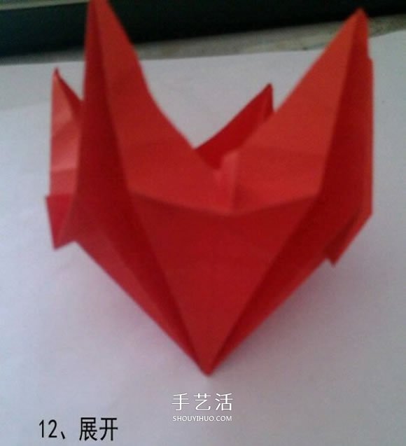 漂亮五角星花怎么折图解 带有五个爱心花瓣 -  www.shouyihuo.com