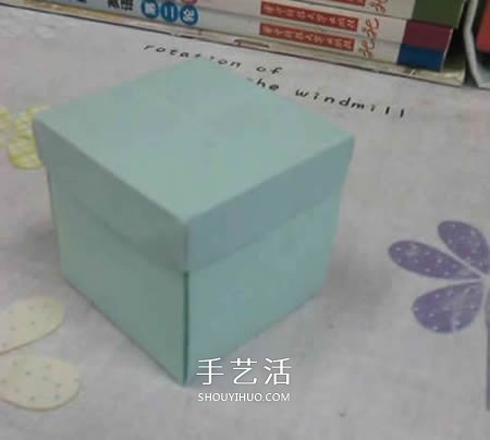 带盖方形包装盒的折法 还包括盒盖上的蝴蝶结 -  www.shouyihuo.com