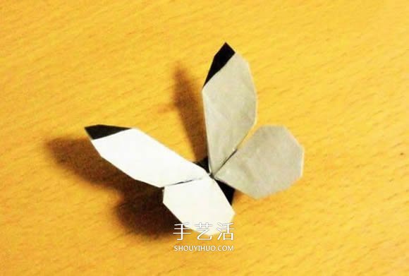 折纸蝴蝶的详细步骤图 手工菜粉蝶的折法图解 -  www.shouyihuo.com