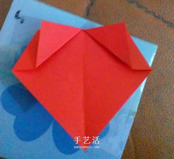 怎么折纸兔子鞋的过程 手工兔子鞋子的折法 -  www.shouyihuo.com
