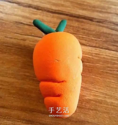 抱胡萝卜的小白兔超轻粘土手工制作图解 -  www.shouyihuo.com