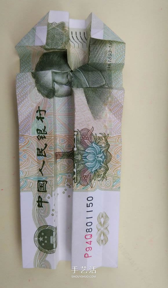 纸币折心花怒放的方法 情人节爱心玫瑰花折法 -  www.shouyihuo.com
