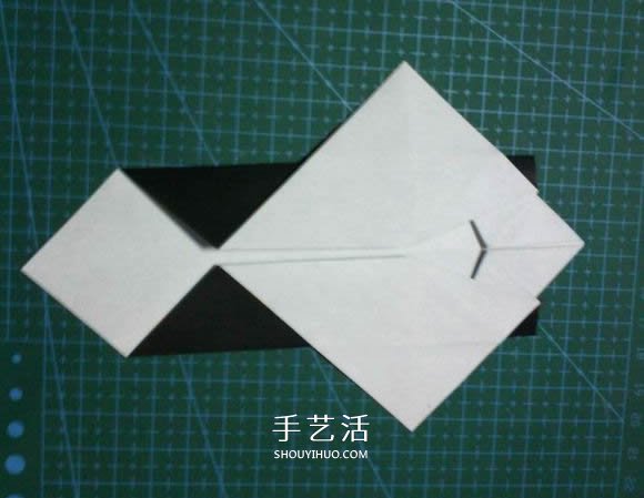 折一只国宝出来！可爱大熊猫的折纸方法图解 -  www.shouyihuo.com
