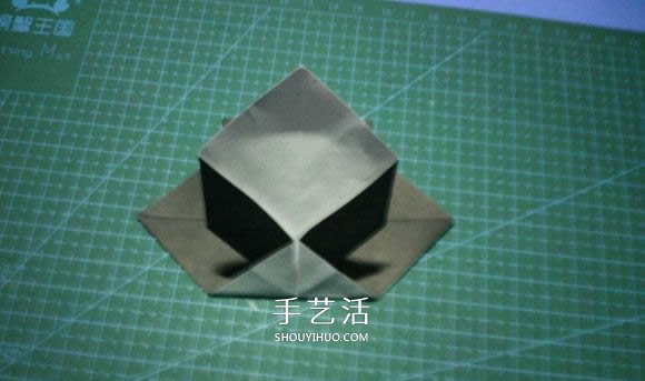 折一只国宝出来！可爱大熊猫的折纸方法图解 -  www.shouyihuo.com